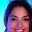 Retrato de Andrea 'Spectra' Rincón, streamer y jugadora de Fortnite, con una sonrisa vibrante